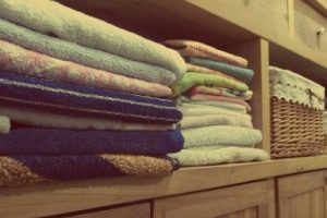 how to organize linens small space without a linen closet